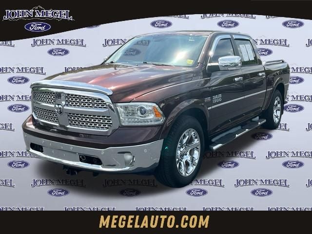 2015 RAM 1500 Laramie in Western Brown — front three-quarter view