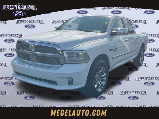 2015 RAM 1500 Laramie Longhorn in Bright White Clearcoat — front three-quarter view