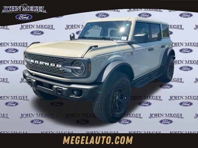 2026 Ford Bronco Badlands in Desert Sand — front three-quarter view
