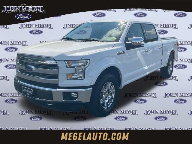 2016 Ford F-150 Lariat in Oxford White — front three-quarter view