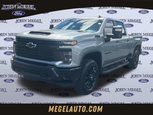 2026 Chevrolet Silverado 2500HD Custom in Sterling Gray Metallic — front three-quarter view