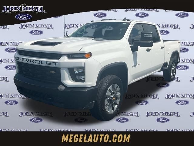2023 Chevrolet Silverado 2500HD Custom in Summit White — front three-quarter view