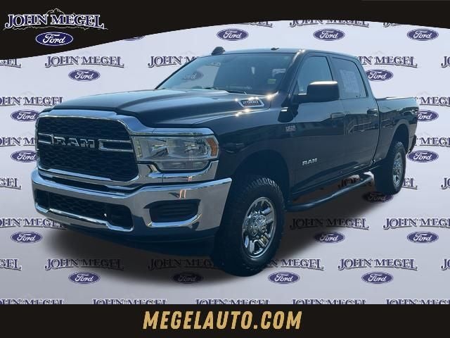 2021 RAM 2500 Tradesman in Diamond Black Crystal Pearlcoat — front three-quarter view