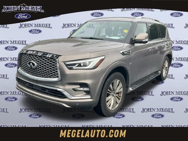 2019 INFINITI QX80 LUXE in Smoky Quartz — front three-quarter view